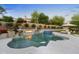 Luxury pool and spa with stonework and landscaping at 9926 E Kemper Way, Scottsdale, AZ 85255