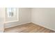 Bedroom with hardwood floors and window seat at 3002 N 70Th St # 239, Scottsdale, AZ 85251