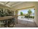 Covered balcony overlooks community; features a view and a pergola at 3002 N 70Th St # 239, Scottsdale, AZ 85251