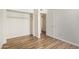Bedroom with hardwood floors and access to bathroom at 3002 N 70Th St # 239, Scottsdale, AZ 85251