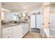 Elegant bathroom with double vanity and large mirror at 7117 E Rancho Vista Dr # 4011, Scottsdale, AZ 85251