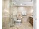 Modern bathroom with glass shower, updated vanity, and beige tile at 7117 E Rancho Vista Dr # 4011, Scottsdale, AZ 85251