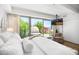 Bright and airy main bedroom with access to private patio at 7117 E Rancho Vista Dr # 4011, Scottsdale, AZ 85251