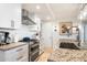 Modern kitchen with stainless steel appliances and white shaker cabinets at 7117 E Rancho Vista Dr # 4011, Scottsdale, AZ 85251