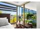 Cozy bedroom with a queen bed, desk and stunning city views at 7117 E Rancho Vista Dr # 4011, Scottsdale, AZ 85251