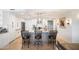 Granite island kitchen with breakfast bar and modern lighting at 7117 E Rancho Vista Dr # 4011, Scottsdale, AZ 85251