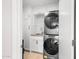 Bright laundry room with stackable washer and dryer at 7117 E Rancho Vista Dr # 4011, Scottsdale, AZ 85251
