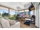 Bright home office with city views, built-in desk, and comfortable seating at 7117 E Rancho Vista Dr # 4011, Scottsdale, AZ 85251