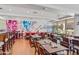 Bright restaurant interior with bar and numerous tables at 7117 E Rancho Vista Dr # 4011, Scottsdale, AZ 85251