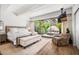Spacious main bedroom with private access to a relaxing patio at 7117 E Rancho Vista Dr # 4011, Scottsdale, AZ 85251