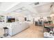 Open concept living space with a comfortable sofa and built in shelving at 7117 E Rancho Vista Dr # 4011, Scottsdale, AZ 85251