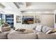 Bright living room with built-in shelving and comfortable seating at 7117 E Rancho Vista Dr # 4011, Scottsdale, AZ 85251