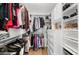 Large closet with custom built-ins and organizers at 7117 E Rancho Vista Dr # 4011, Scottsdale, AZ 85251