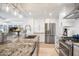 Modern kitchen with granite countertops and stainless steel appliances at 7117 E Rancho Vista Dr # 4011, Scottsdale, AZ 85251