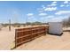 Long wooden fence runs the length of the property line at 270 S Ralston Rd, Maricopa, AZ 85139