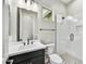 Modern bathroom with a walk-in shower, vanity, and toilet at 19003 W Lawrence Rd, Waddell, AZ 85355