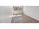 Simple bedroom with tile floor and window at 19003 W Lawrence Rd, Waddell, AZ 85355