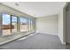 Spacious bedroom with carpet and large windows at 19003 W Lawrence Rd, Waddell, AZ 85355
