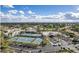 Aerial view showing tennis courts and clubhouse at 7700 E Gainey Ranch Rd # 103, Scottsdale, AZ 85258