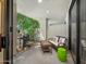 Private patio with seating area and built-in grill at 7700 E Gainey Ranch Rd # 103, Scottsdale, AZ 85258