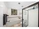Bathroom features a soaking tub and a walk-in shower at 7700 E Gainey Ranch Rd # 103, Scottsdale, AZ 85258