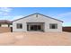 Large backyard with desert landscaping and home view at 37535 W Padilla St, Maricopa, AZ 85138