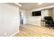 Home office with built-in desk and access to a bathroom at 241 S Aquamarine Dr, Apache Junction, AZ 85119