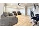 Relaxing living area featuring comfortable sofas and light flooring at 241 S Aquamarine Dr, Apache Junction, AZ 85119