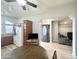 Open concept kitchen and dining area with light wood cabinets and flooring at 241 S Aquamarine Dr, Apache Junction, AZ 85119
