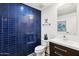 Modern bathroom with blue tile and floating vanity at 310 S 4Th St # 1905, Phoenix, AZ 85004