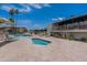 Community pool and spa with lounge chairs and patio area at 8055 E Thomas Rd # E117, Scottsdale, AZ 85251