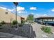 Exterior view of building, landscaping, and parking lot at 8055 E Thomas Rd # E117, Scottsdale, AZ 85251