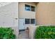 Front entrance of condo with walkway and landscaping at 8055 E Thomas Rd # E117, Scottsdale, AZ 85251