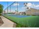 Outdoor tennis court with chain link fence and green landscaping at 8055 E Thomas Rd # E117, Scottsdale, AZ 85251