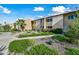 Condo building with landscaping and walkway at 8055 E Thomas Rd # E117, Scottsdale, AZ 85251