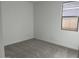 Bright bedroom featuring grey carpet and a window at 7689 W Tether Trl, Peoria, AZ 85383