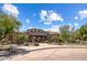 Community center with a stone facade and fountains at 19550 N Grayhawk Dr # 1084, Scottsdale, AZ 85255