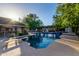 Refreshing pool with diving board and covered patio area at 1020 E Caroline Ln, Tempe, AZ 85284
