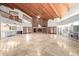 Spacious great room with high ceilings, brick fireplace, and lots of natural light at 1020 E Caroline Ln, Tempe, AZ 85284