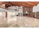 Grand great room with high ceilings, brick fireplace, and hardwood floors at 1020 E Caroline Ln, Tempe, AZ 85284