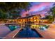 Expansive backyard oasis featuring a large pool and spa at 1020 E Caroline Ln, Tempe, AZ 85284