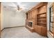 Bright Gathering room with a fireplace and ample built-in shelving at 1020 E Caroline Ln, Tempe, AZ 85284
