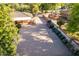 Large driveway and backyard with mature trees and landscaping at 1020 E Caroline Ln, Tempe, AZ 85284