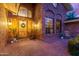 Brick front entrance with wooden door and decorative lighting at 1020 E Caroline Ln, Tempe, AZ 85284