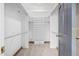 Large walk-in closet with hanging rods and shelving at 1020 E Caroline Ln, Tempe, AZ 85284