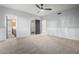 Spacious bedroom with carpeted floor, ceiling fan, and ample closet space at 1020 E Caroline Ln, Tempe, AZ 85284