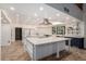 Spacious kitchen with large island, stainless steel appliances, and ample cabinetry at 1020 E Caroline Ln, Tempe, AZ 85284