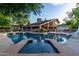 Large pool and spa with adjacent house and slide at 1020 E Caroline Ln, Tempe, AZ 85284