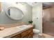 Clean bathroom with updated vanity and shower at 1020 E Caroline Ln, Tempe, AZ 85284