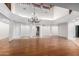 Bright dining room featuring hardwood floors and chandelier at 1020 E Caroline Ln, Tempe, AZ 85284